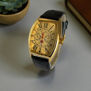 franck muller golden bezzel golden dial black strap.png